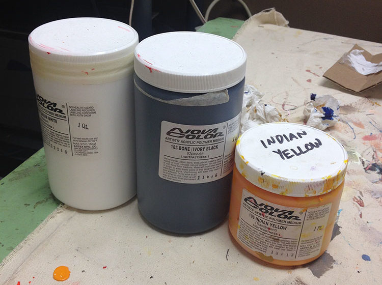Nova Color paint in quart and pint sized jars.