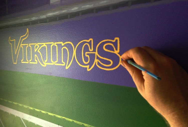 Painting in the logo precisely.